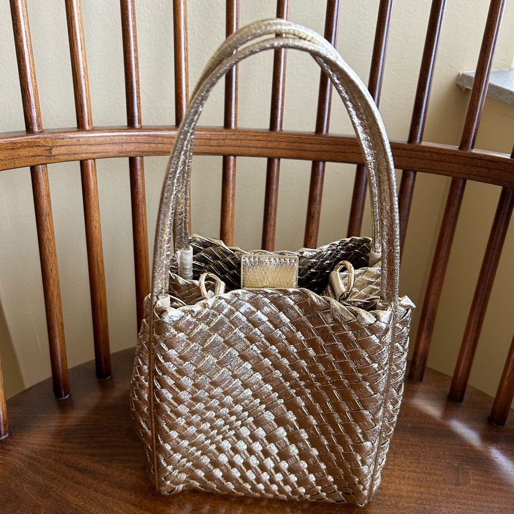 Anthropology, the woven mini Hollace Tote in gold